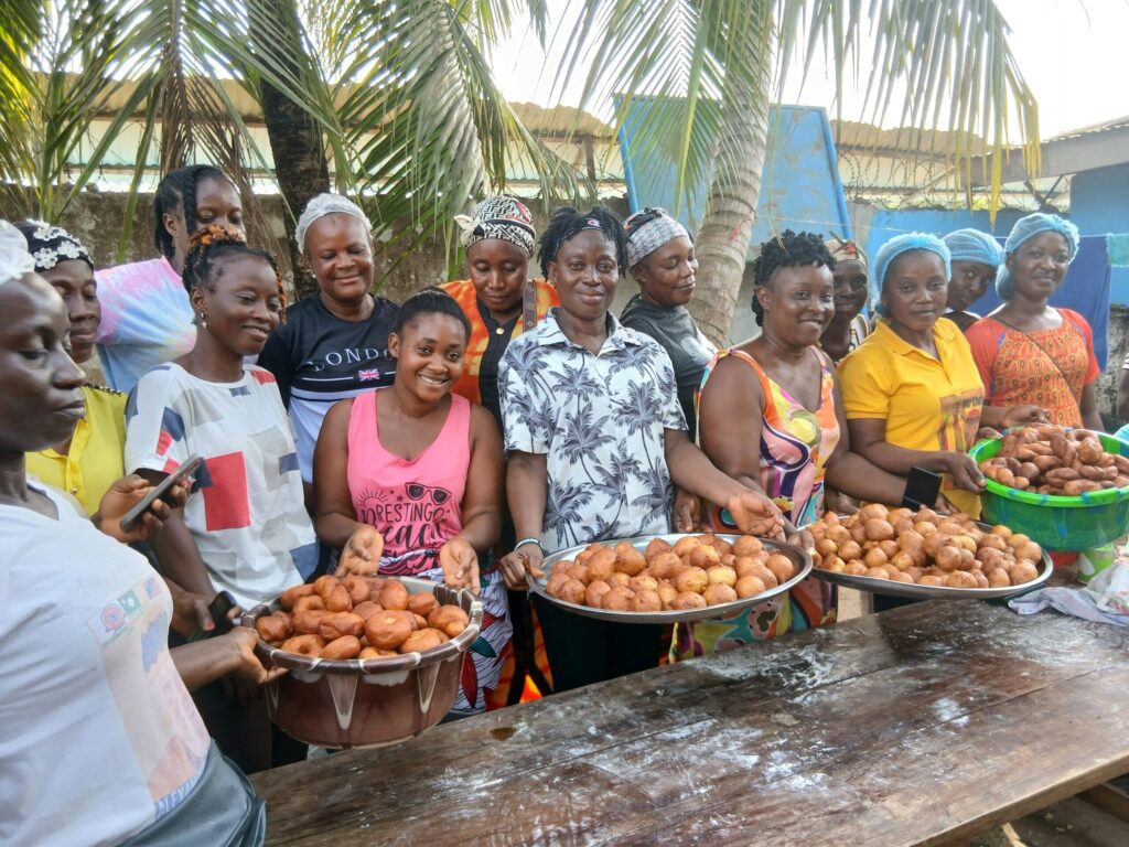 Women of our Women's Club showing their produce, Kala.