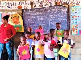Damiefa School - children showing artwork